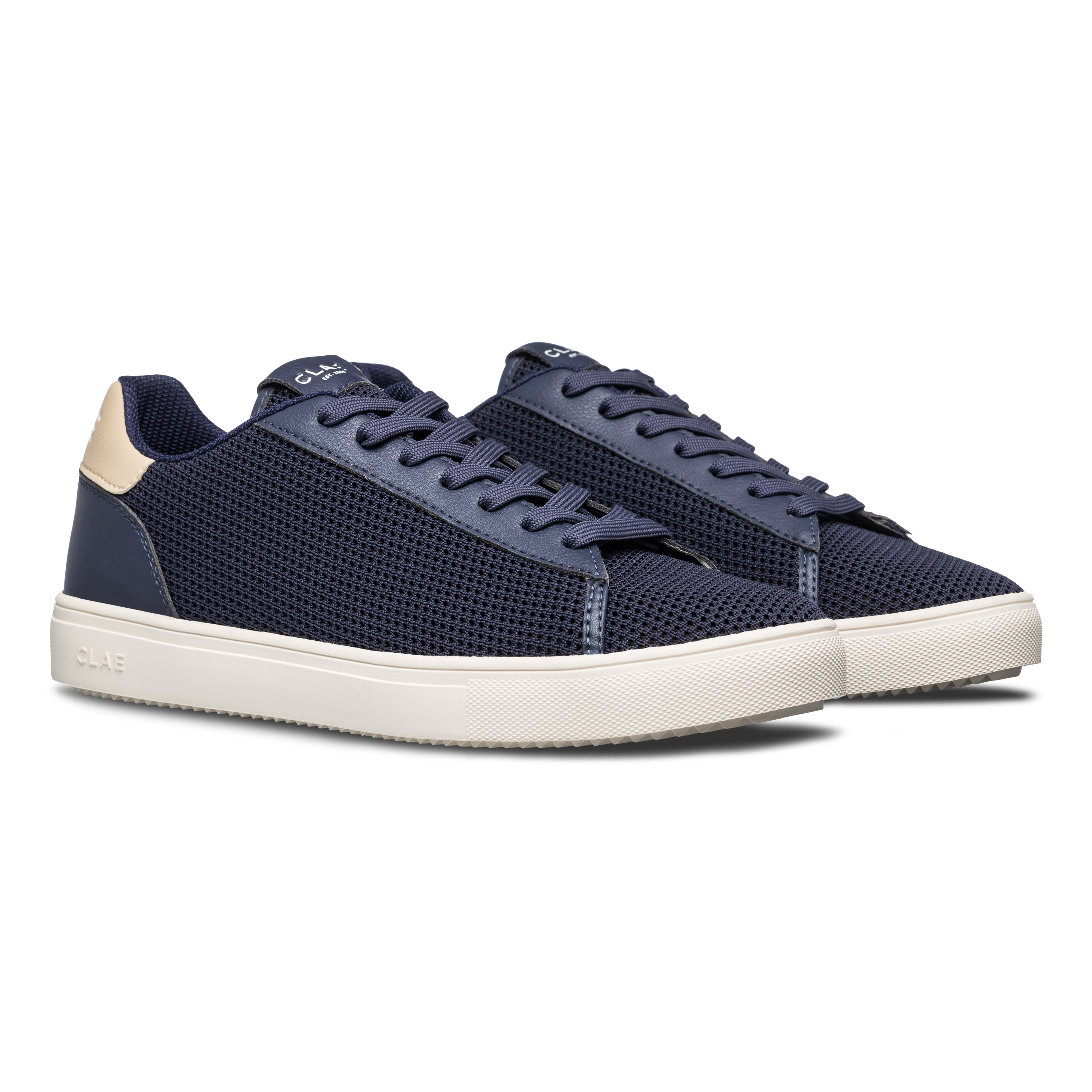 Three-quarter view of Bradley Knit shoe in Navy Safari, highlighting breathable knitted upper and modern classic design.