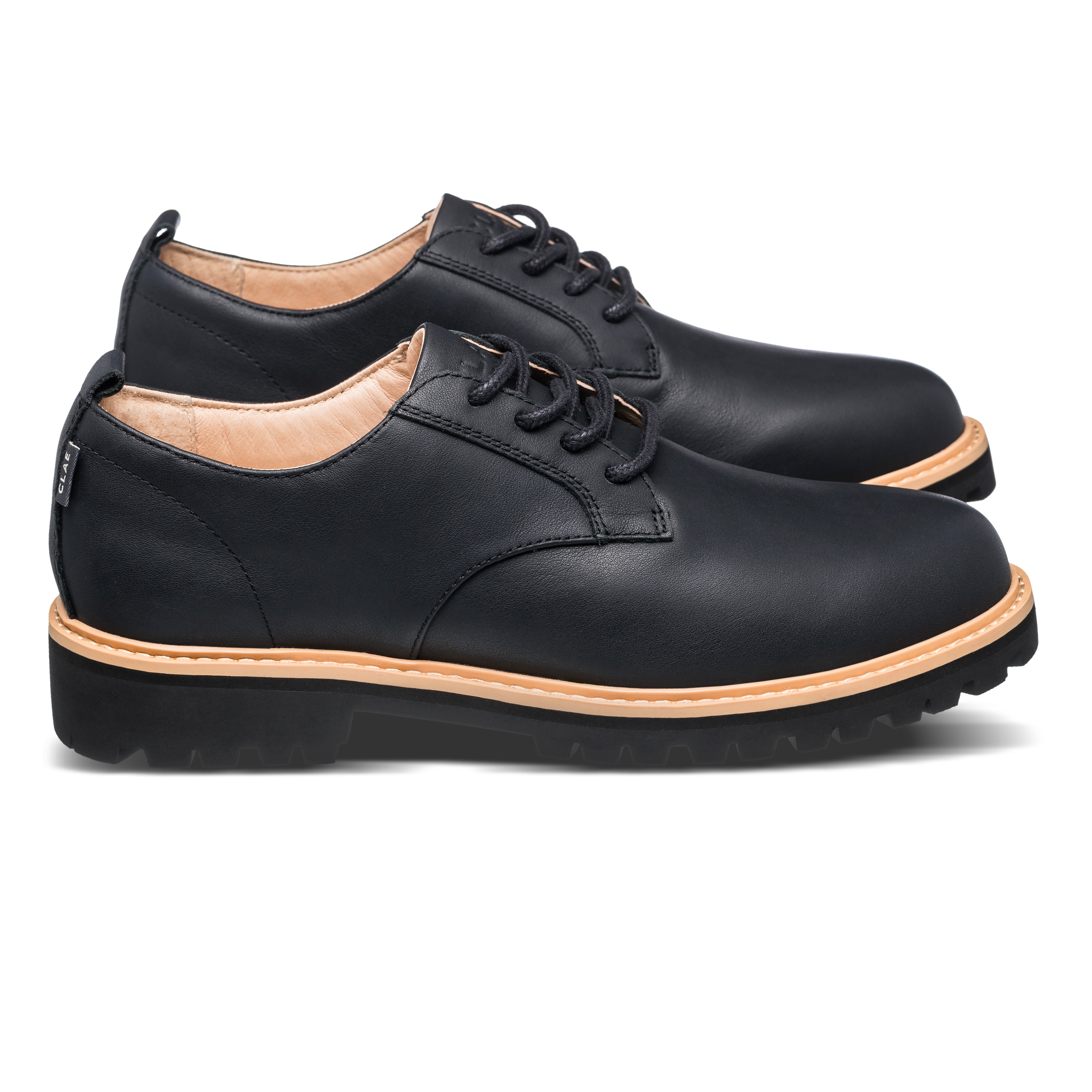 Logan Heritage Collection derby shoe in Black with water-repellent leather upper, side view showing classic round-toe design and welt construction.