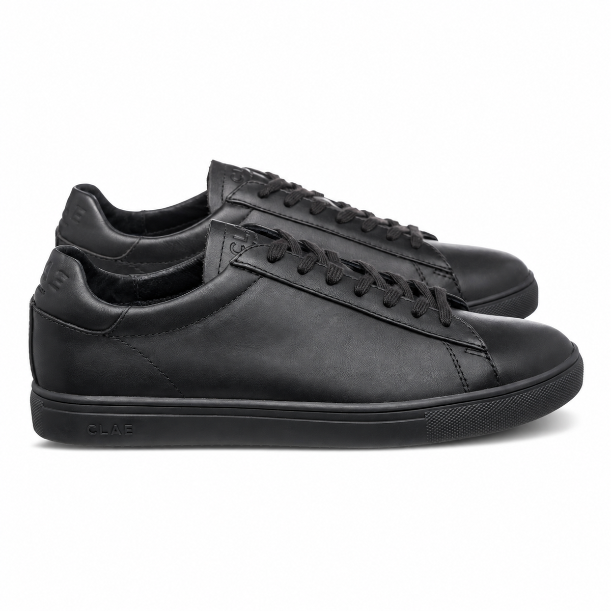 CLAE Bradley Essentials Triple Black Leather — side view pair