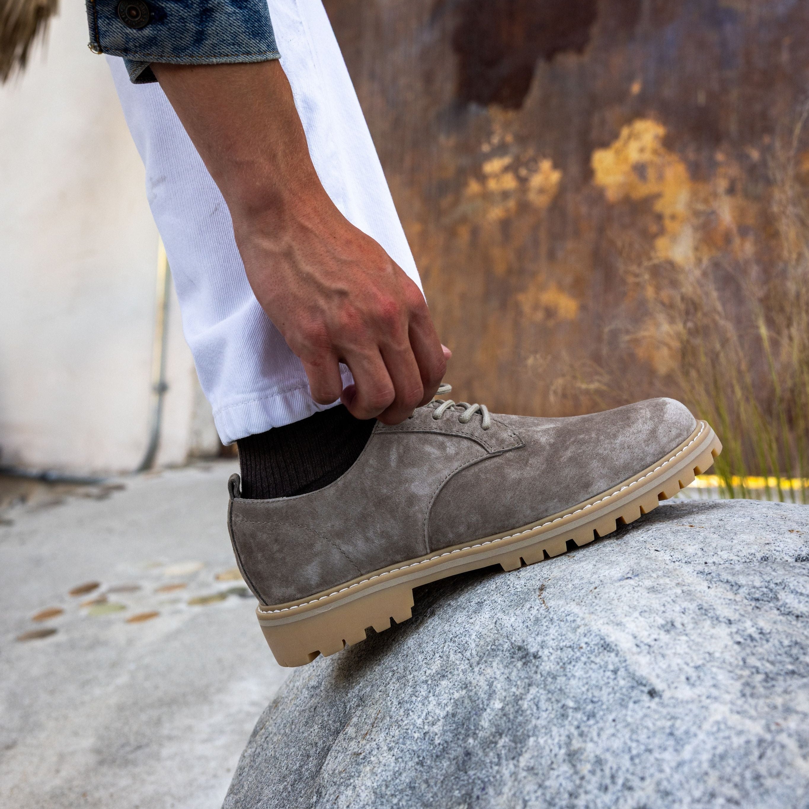 Logan Heritage Collection derby shoe in Silver Mink Suede worn in casual lifestyle setting, highlighting comfort, premium suede, and durable design.