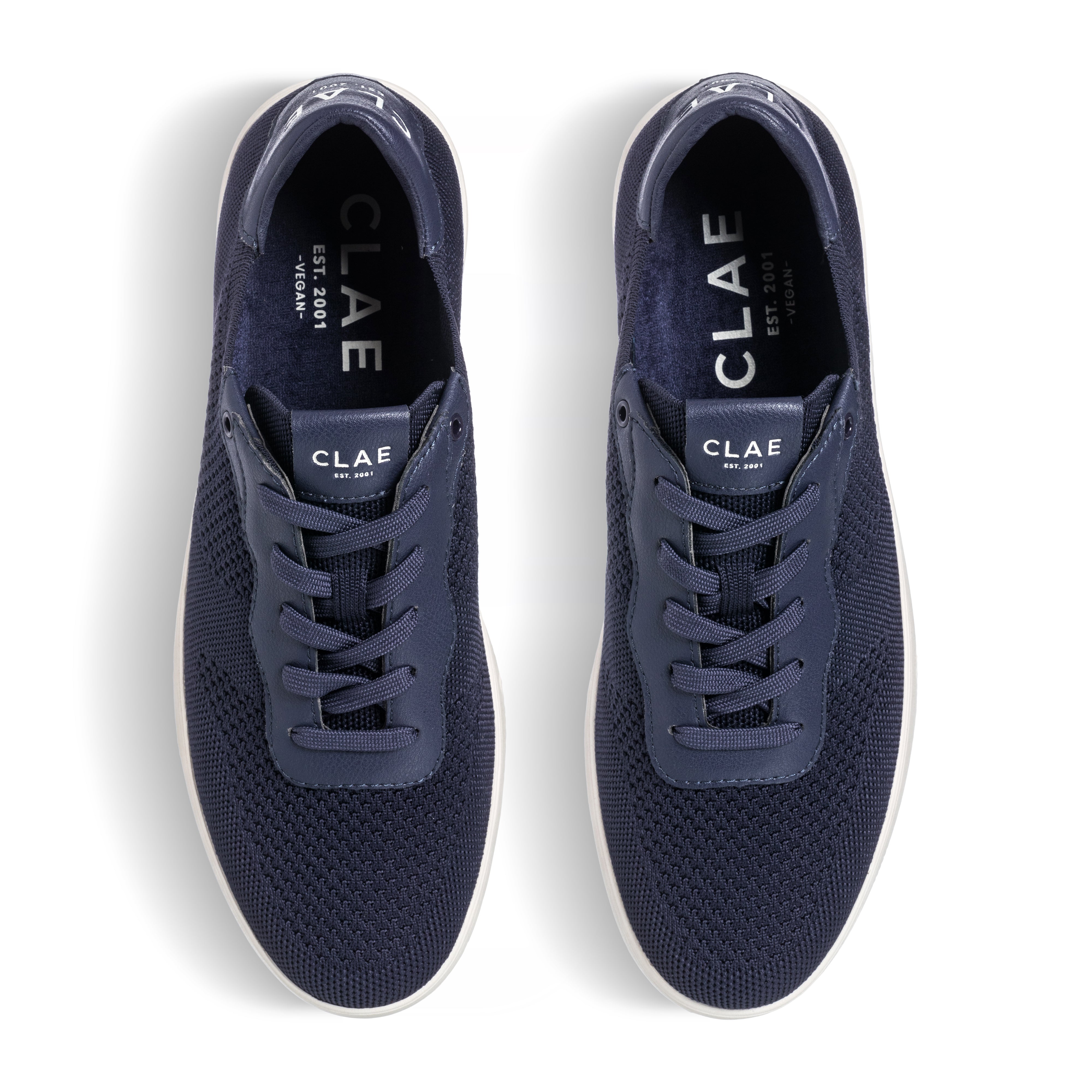Top view of Malone Knit court shoe in Navy, showing knitted SEAQUAL® YARN upper and lace details.