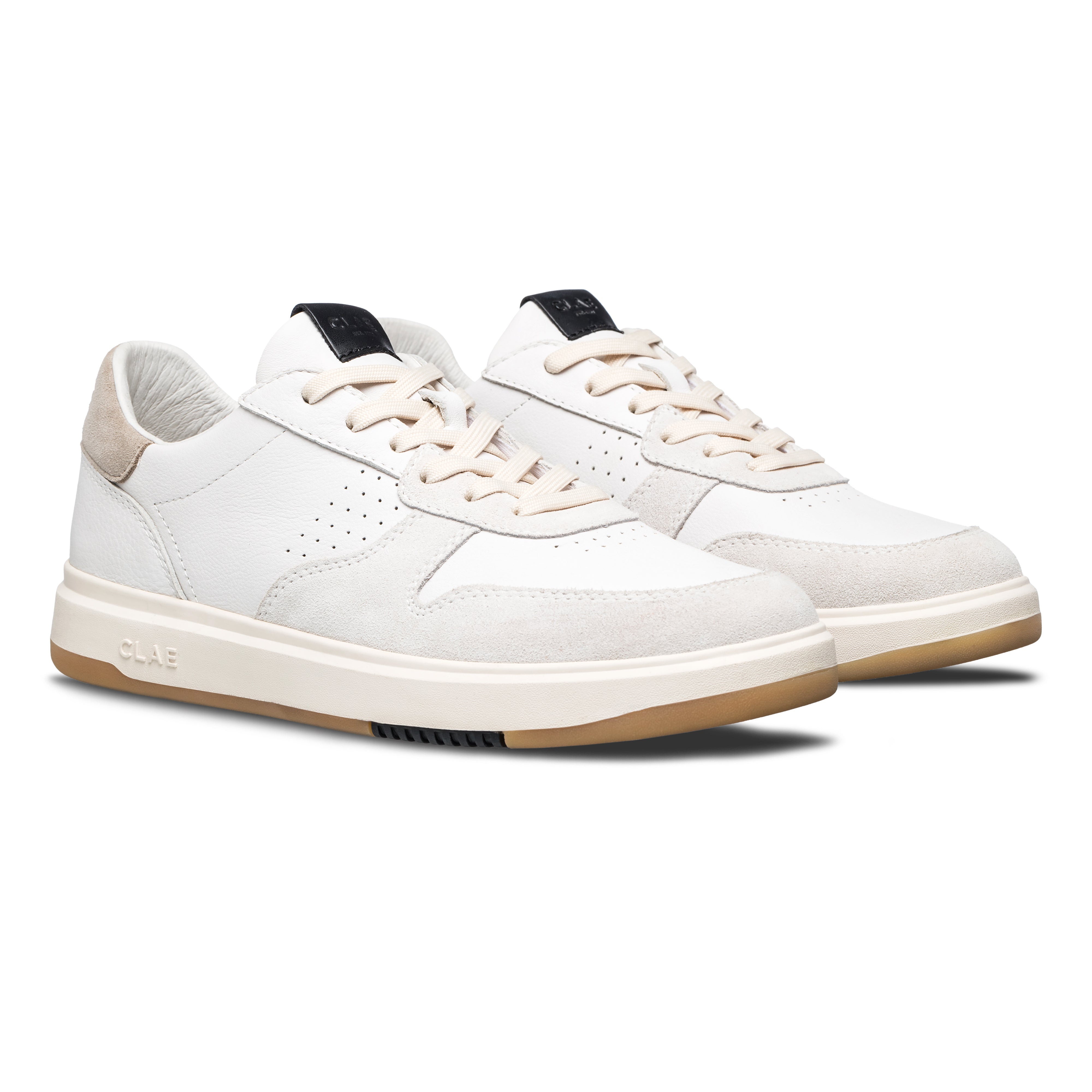 Three-quarter view of Moses sneaker in White Feather Black, highlighting premium materials and All Court (AC) outsole construction.