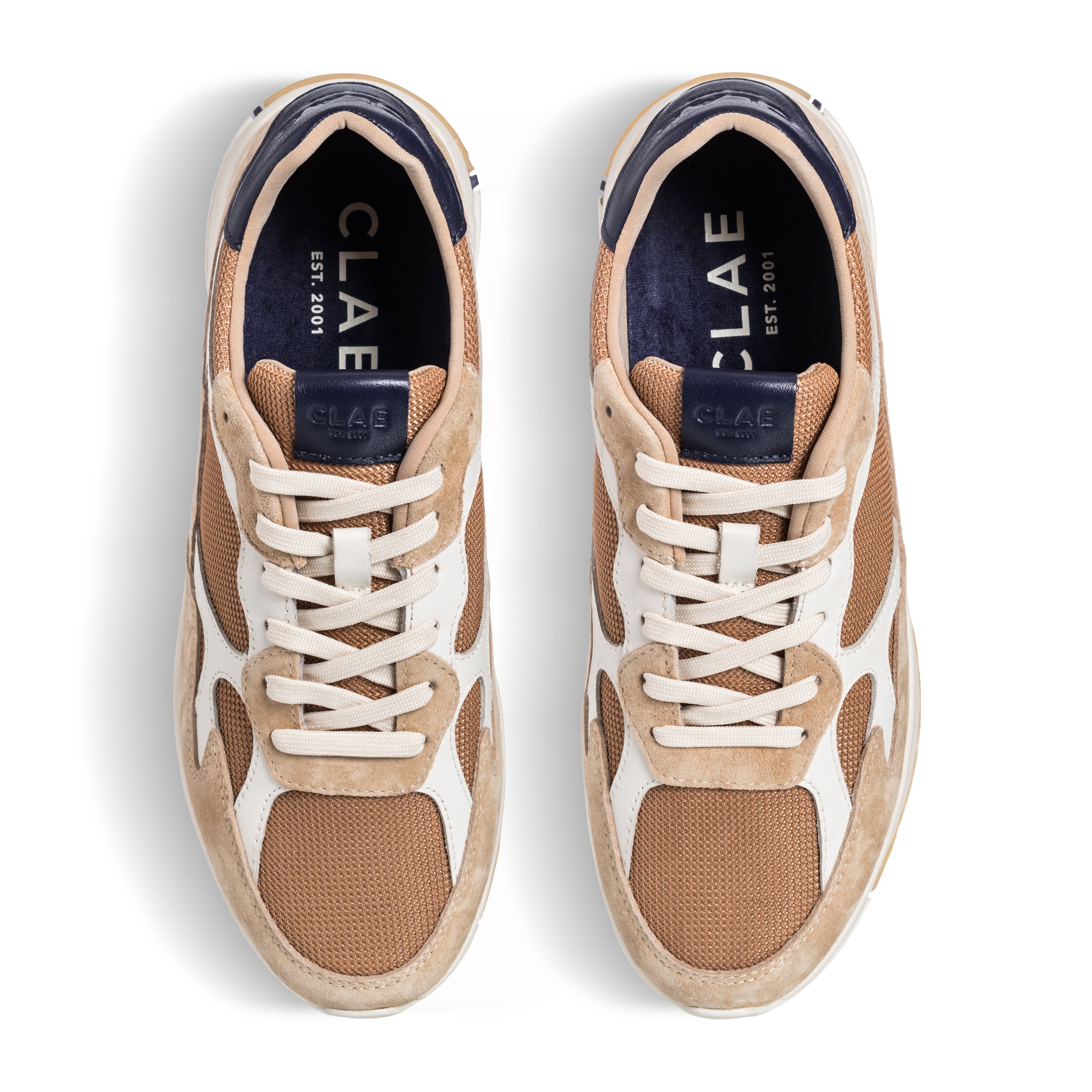 Top view of Zuma runner in Safari Doe Navy, showing leather, suede, and recycled mesh upper with lace details.